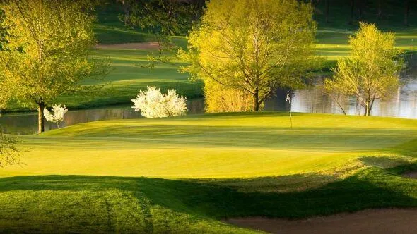 Covered composite deck with grill station in Rivercut