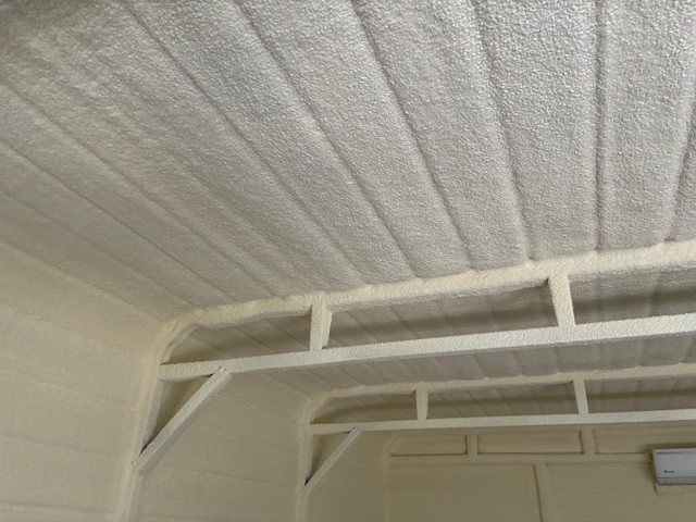 a flock of birds sitting on top of a power line