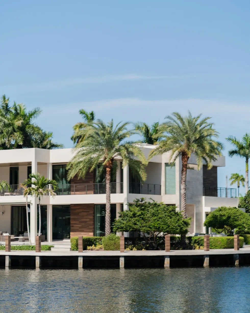 Luxury waterfront custom home showcasing modern architecture, premium exterior finishes, and expert residential construction by Miami Builders.