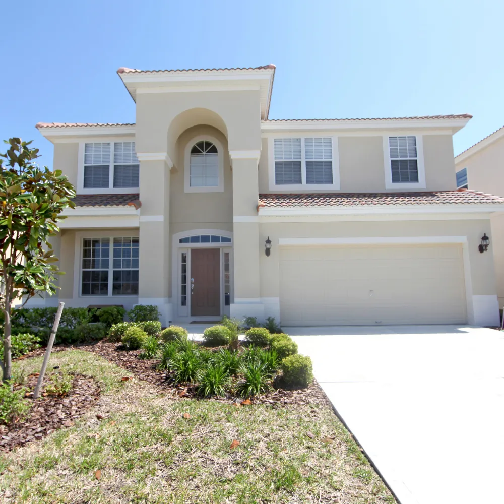 Beautifully renovated home exterior featuring modern architecture and enhanced curb appeal by Miami Builders.