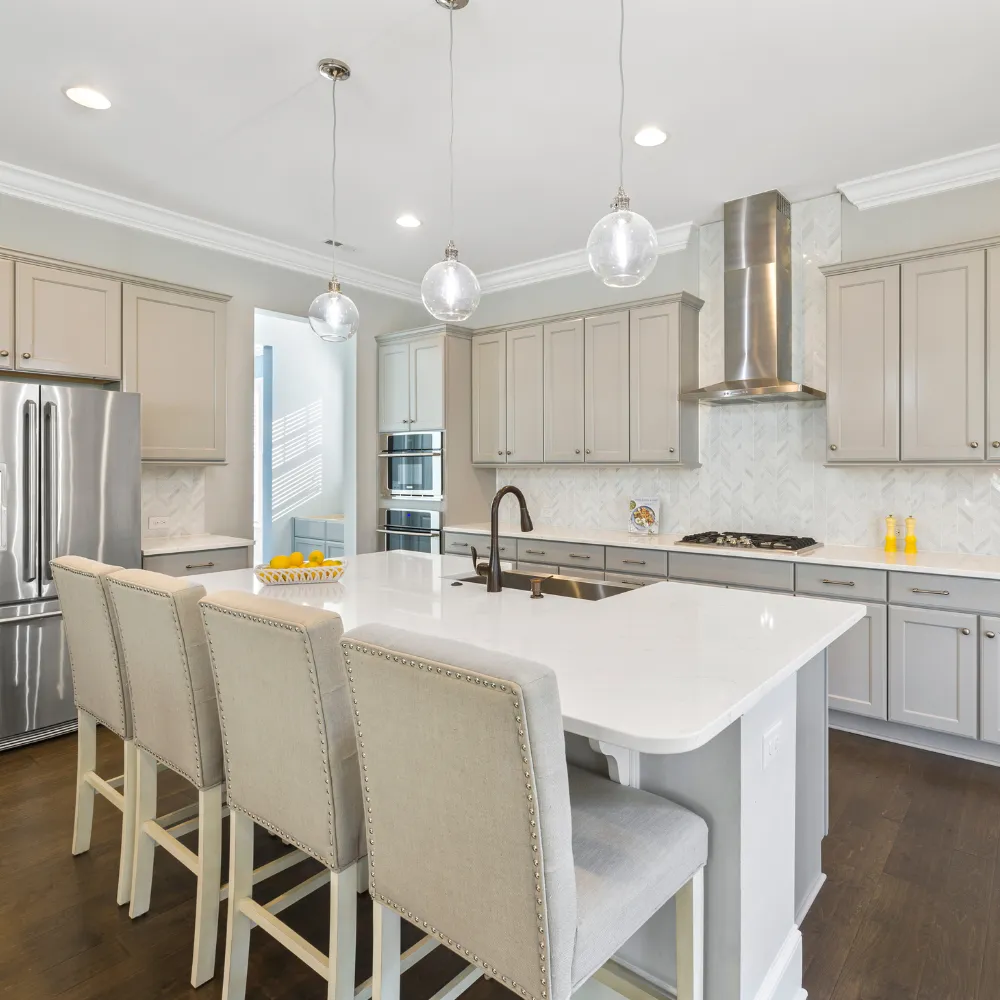 Custom kitchen remodeling featuring a large island, premium cabinetry, and open concept design by Miami Builders.