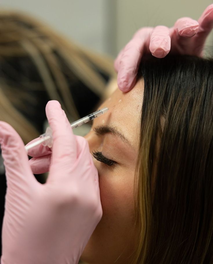 Aerial view of Atlantic Avenue in Downtown Delray Beach, Florida, showing the vibrant local community served by Alluring Image Medspa.