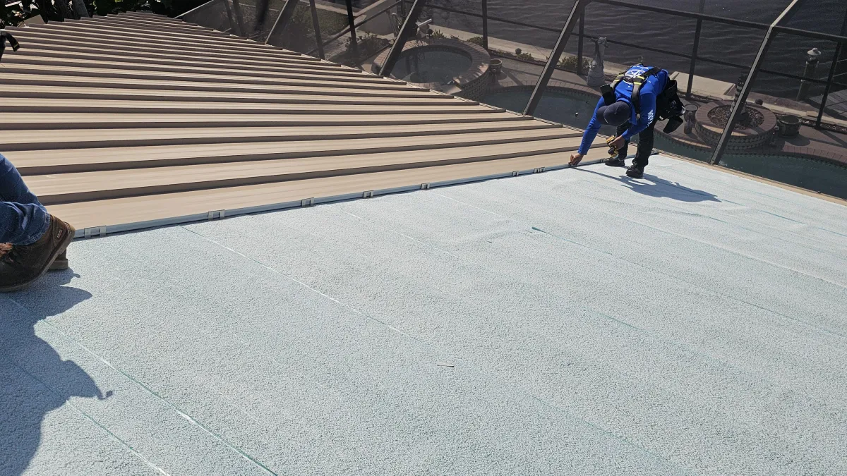 the roof of a building with a clock on it