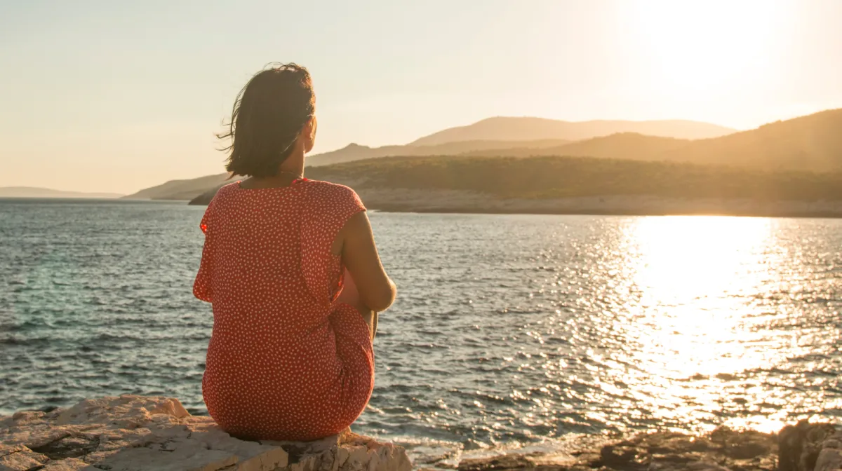 a bunch of neon lights hanging from a ceiling