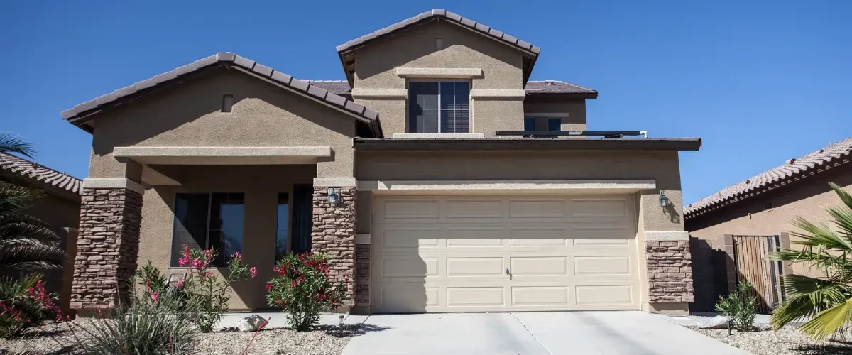 Clean suburban home exterior with freshly washed driveway in Phoenix Arizona