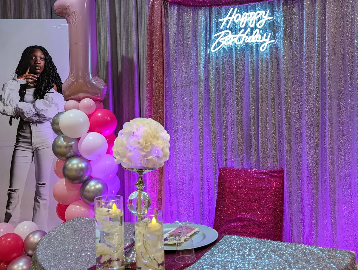 black and gold book on brown wooden table