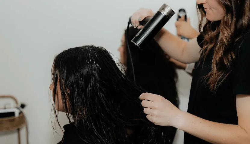 Client receiving a light blow-dry at the end of a Hana head spa