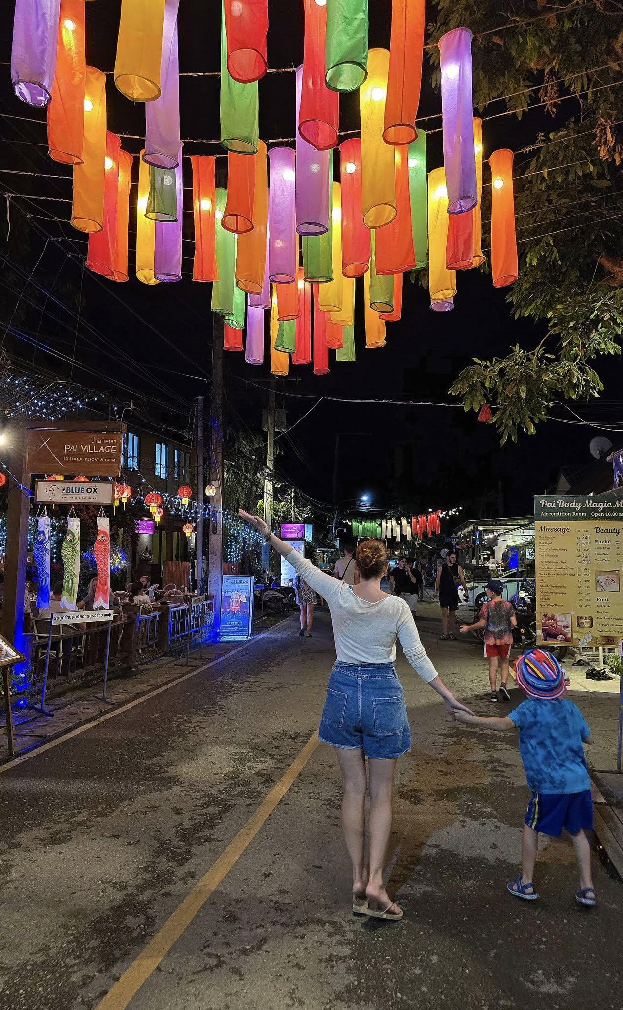 Jennifer and one of the boys under lanterns in Thailand