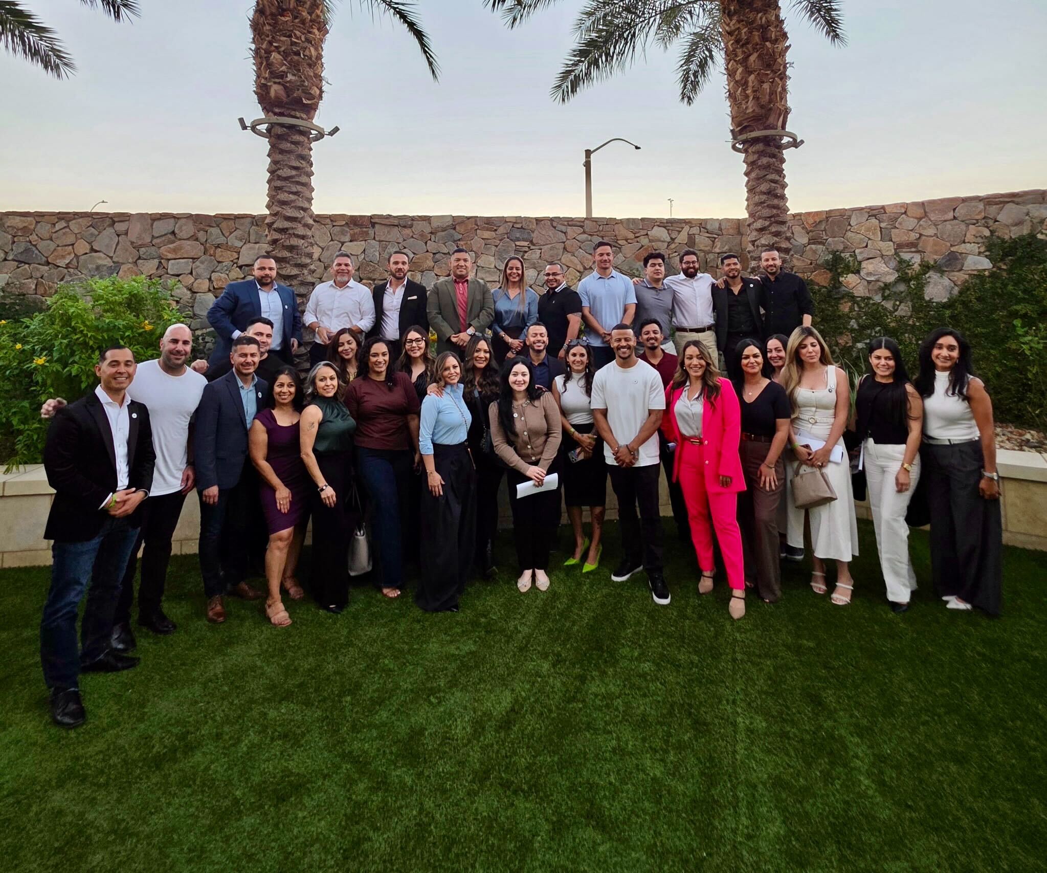 AZ PAK team group photo, diverse professionals, modern office, collaborative atmosphere, smiling faces