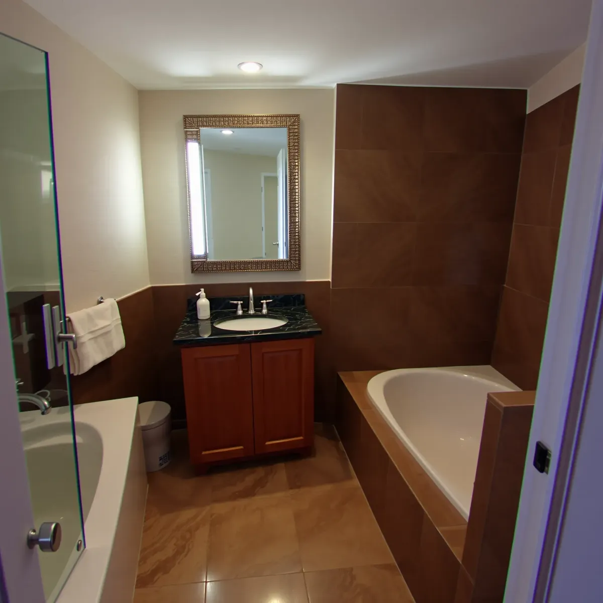 Bathroom Remodeling in Lennox, CA showcasing a modern, elegant space with stylish fixtures, tiles, and lighting.