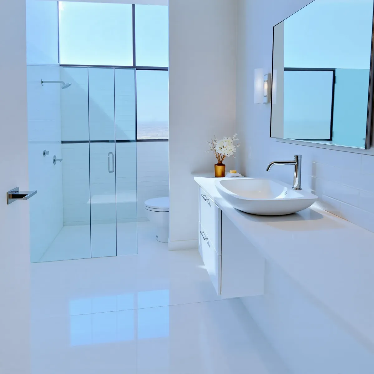 Renovated Santa Monica bathroom with modern design, glass shower, marble countertops, and coastal-inspired decor.
