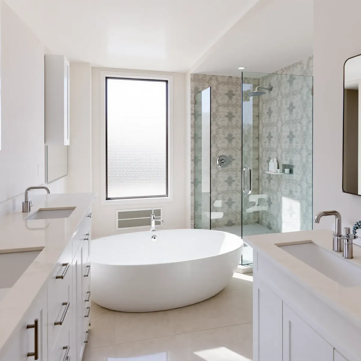 Remodeled Jefferson Park bathroom with modern fixtures, marble countertops, walk-in shower, soaking tub, and natural light.