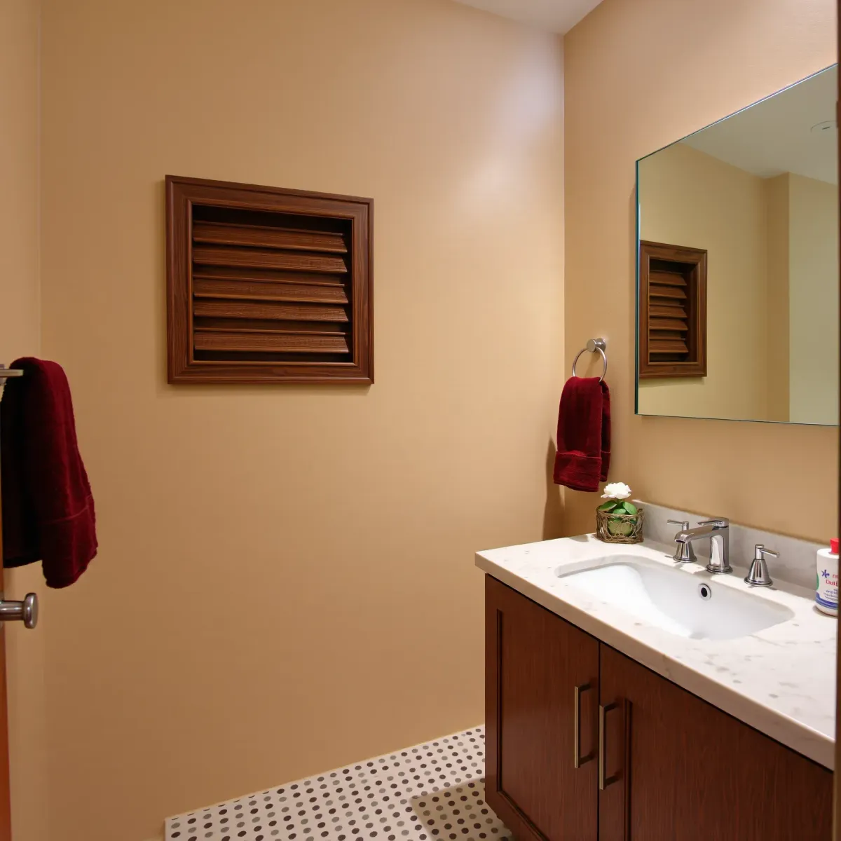 Small renovated bathroom in Fairfax District, CA with modern fixtures and clean, stylish design.
