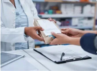 Pharmacist in Sydney receiving tailored documentation for a cost-effective Managed Print Plan.