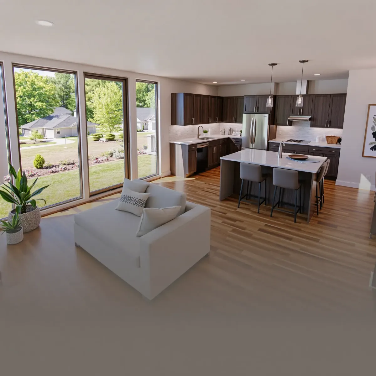Modern interior of a fully remodeled house in Maryville, TN featuring a bright, open-concept living room and kitchen with high-end finishes.