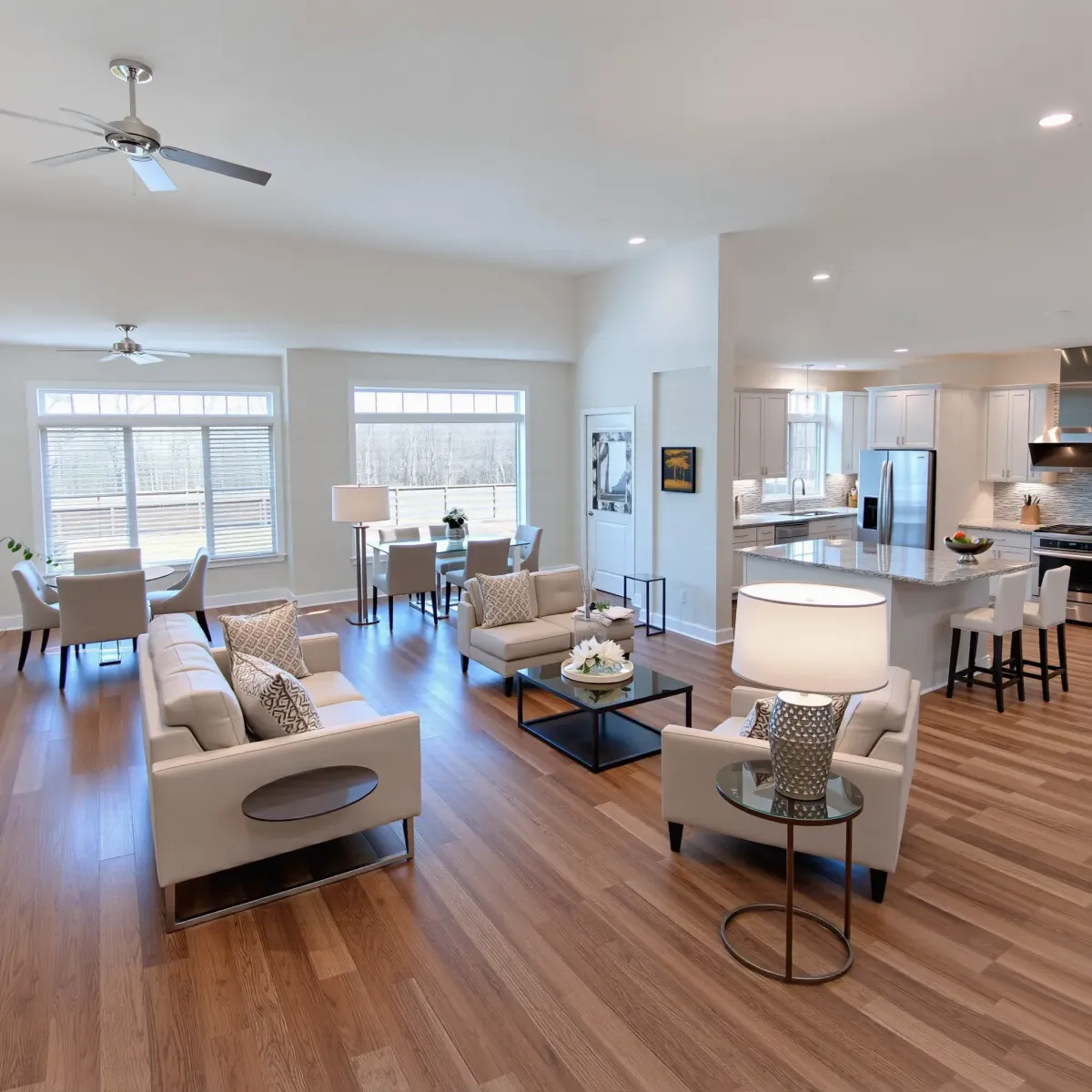 Modern renovated Clinton, TN home with new siding, windows, lush yard, driveway, and neighborhood ambiance.