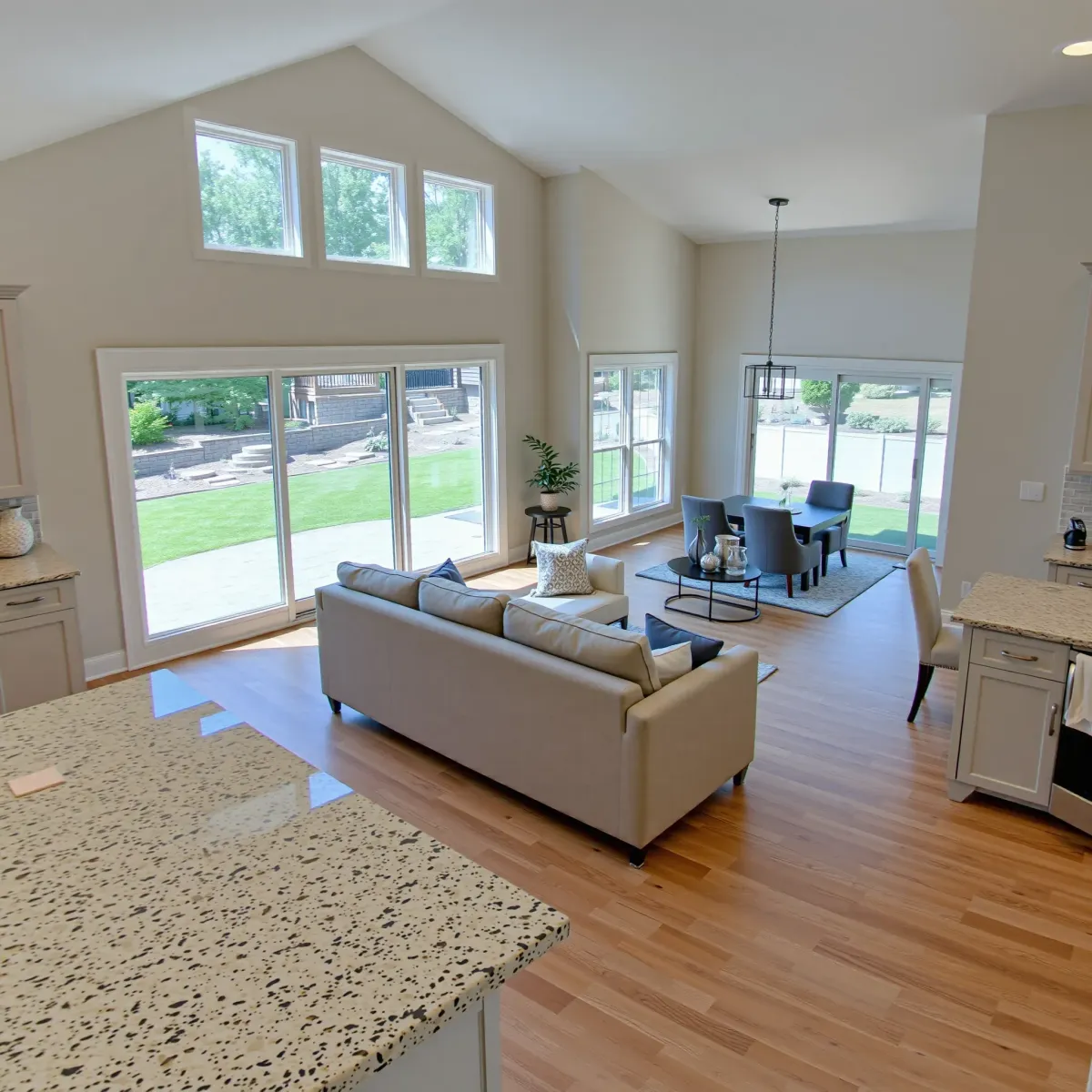 Modern renovated Tellico Village home with landscaped gardens, scenic lake view, and stylish architectural details.