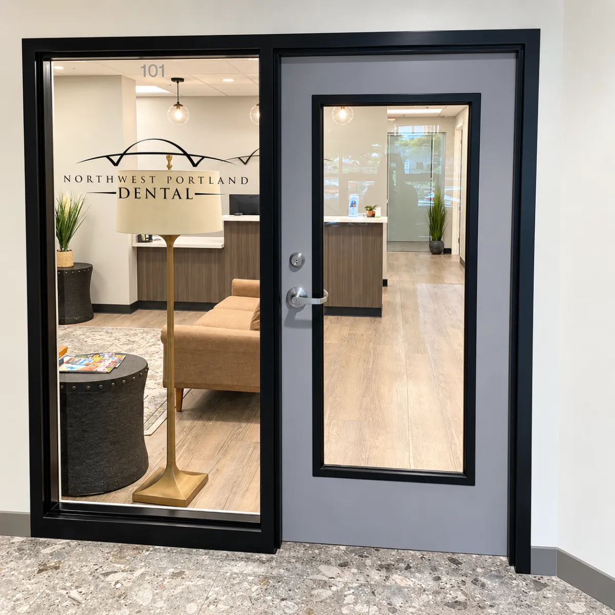 Interior building directory and doorway to Suite 101