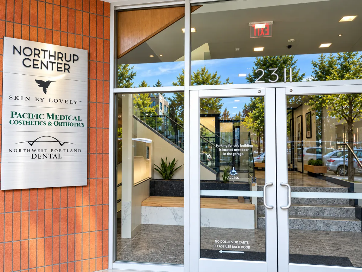 Main glass entryway and architectural doorway into Northwest Portland Dental