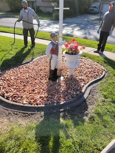 Professional softscape design featuring shrubs, flower beds, and decorative mulch in Utah residential yard