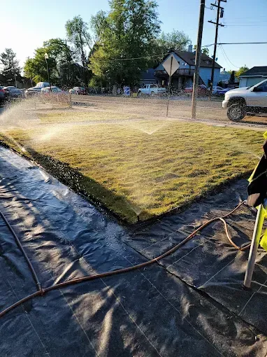 Professional irrigation system setup by Howard & Family Lawn Services for water-saving lawn care in Utah