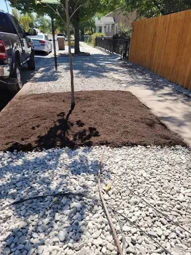 Crew building a privacy fence in a Utah backyard