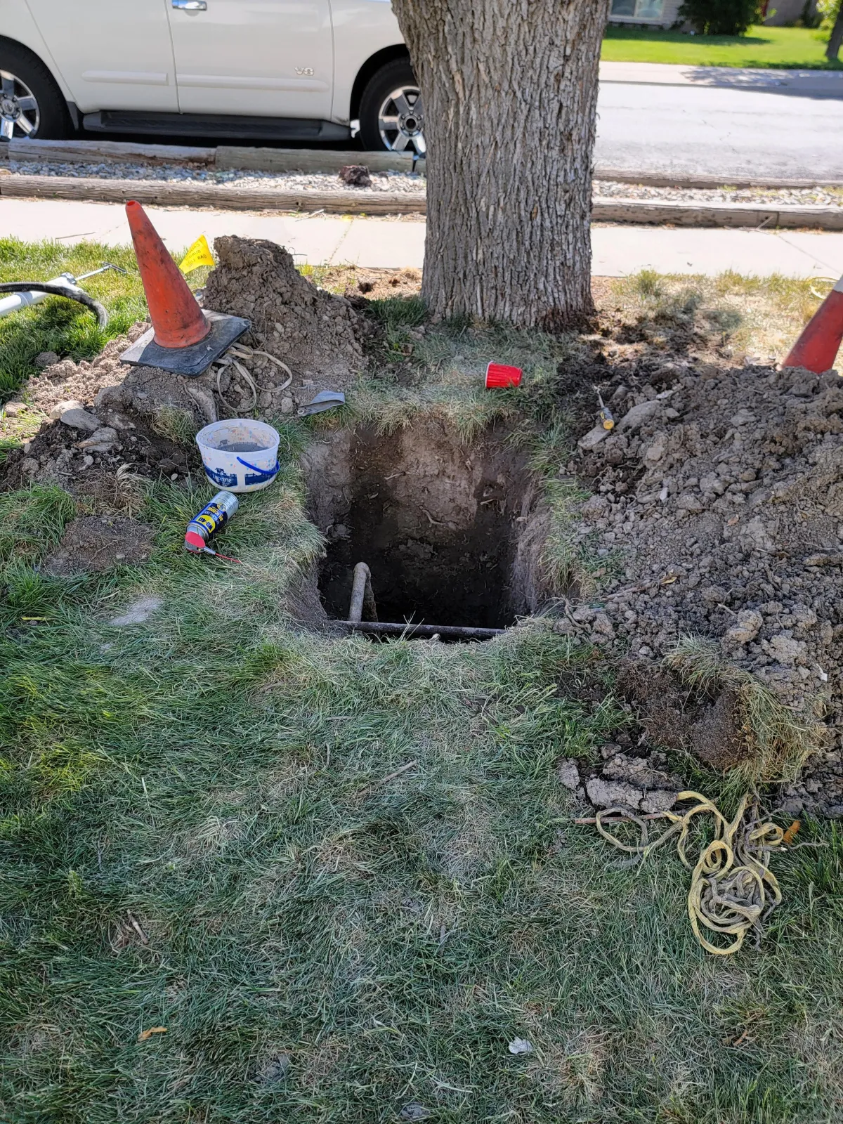 Automatic sprinkler system watering freshly sodded lawn