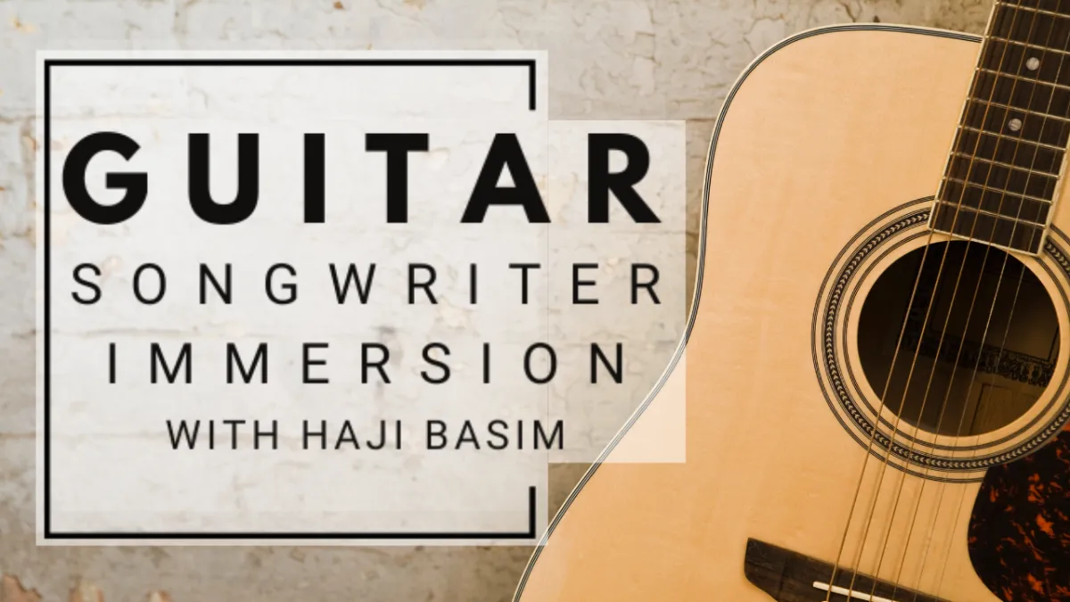 Man playing acoustic guitar outdoors