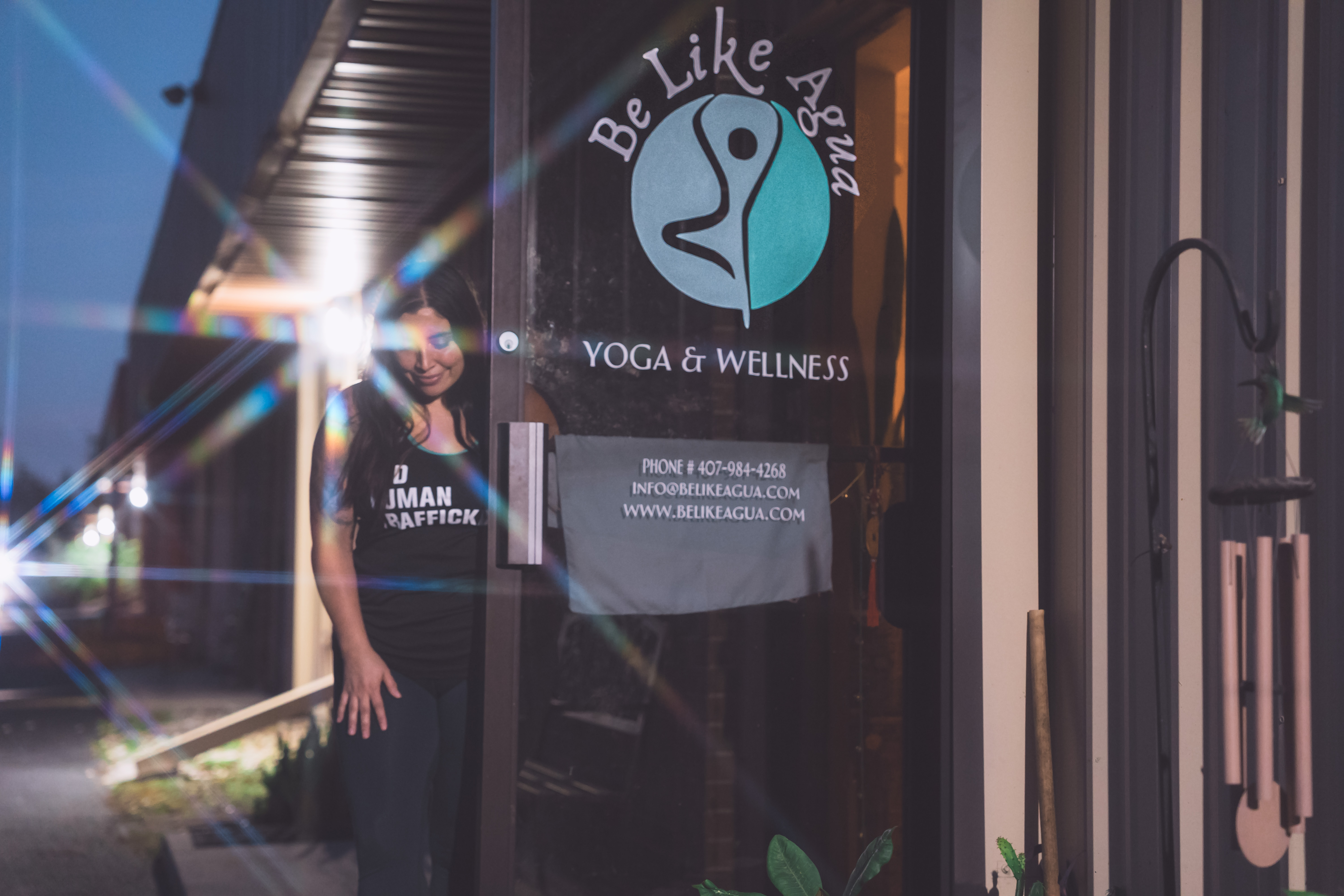 Misty mountains reflected in a calm lake at dusk