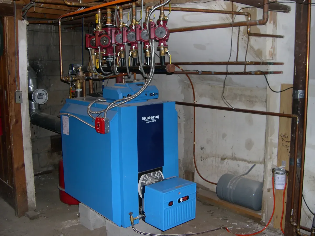 A newly installed hot water furnace in Southern Maine, installed by 1Call Plumbing