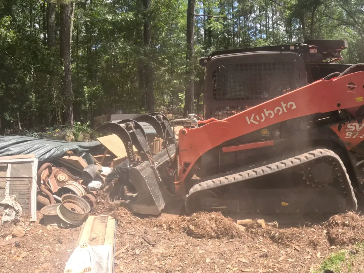 Debris removal following land clearing to create a clean and organized property