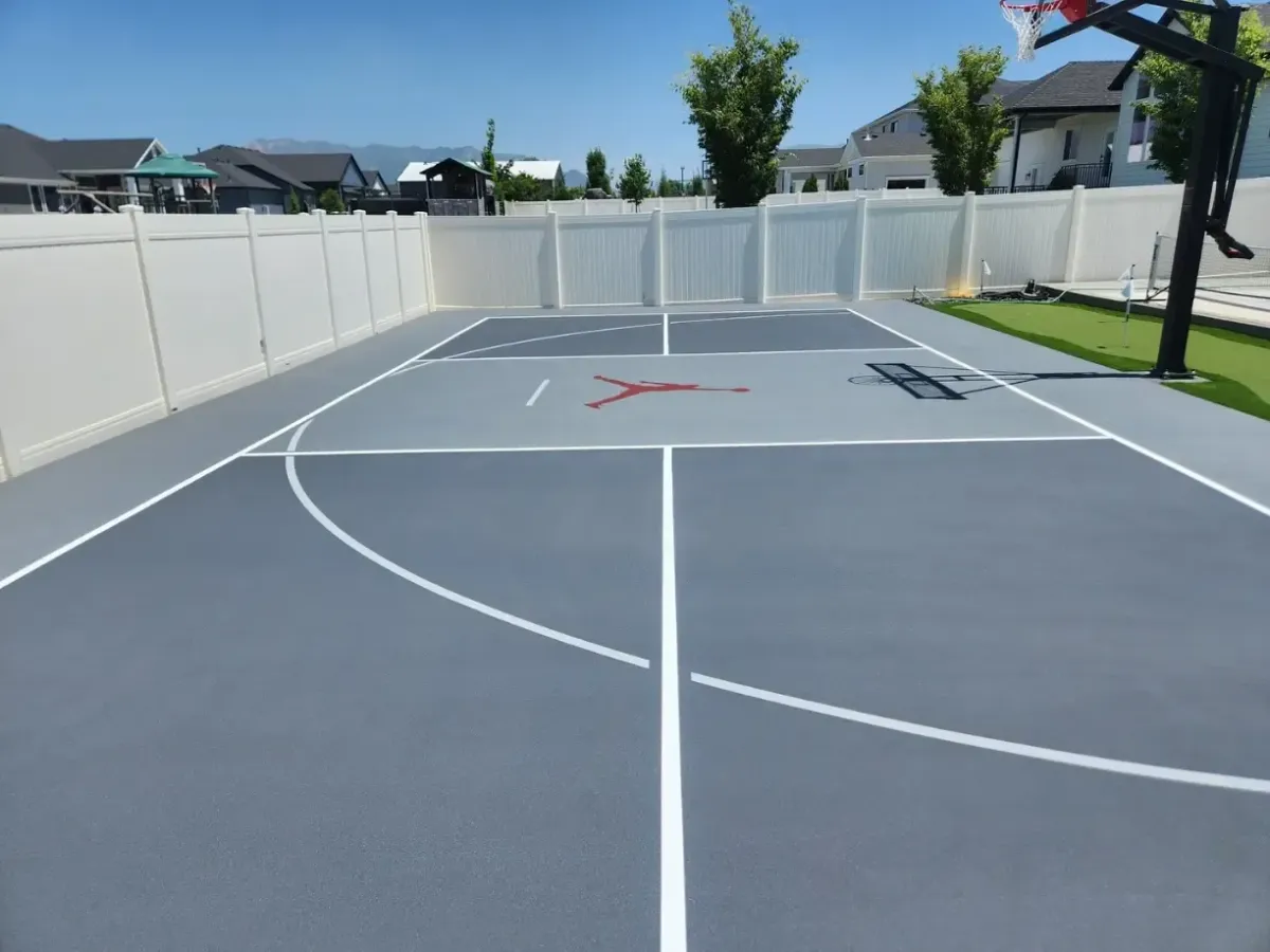 image of a residential basketball court turned into pickleball court