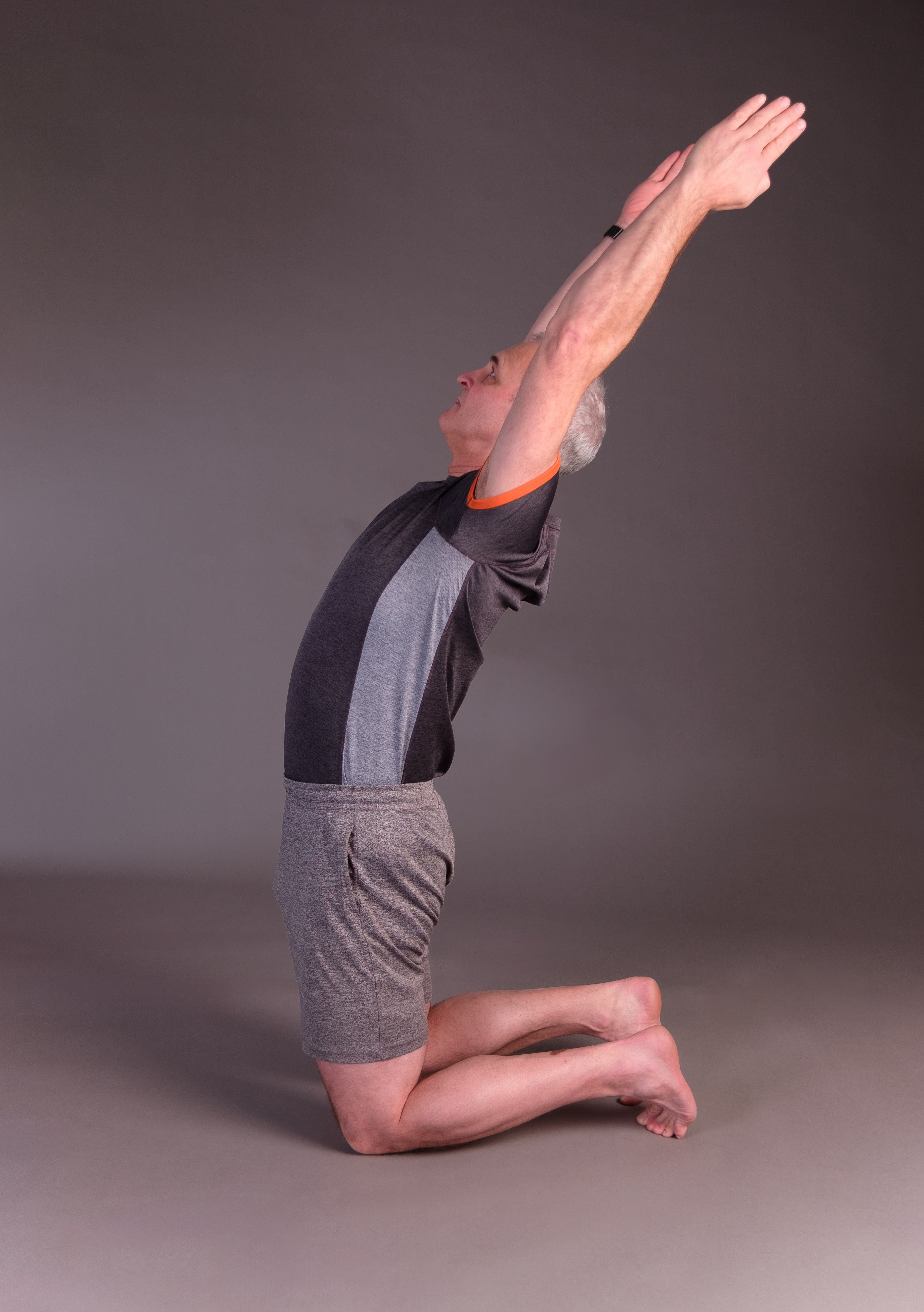Student stretching during yoga class