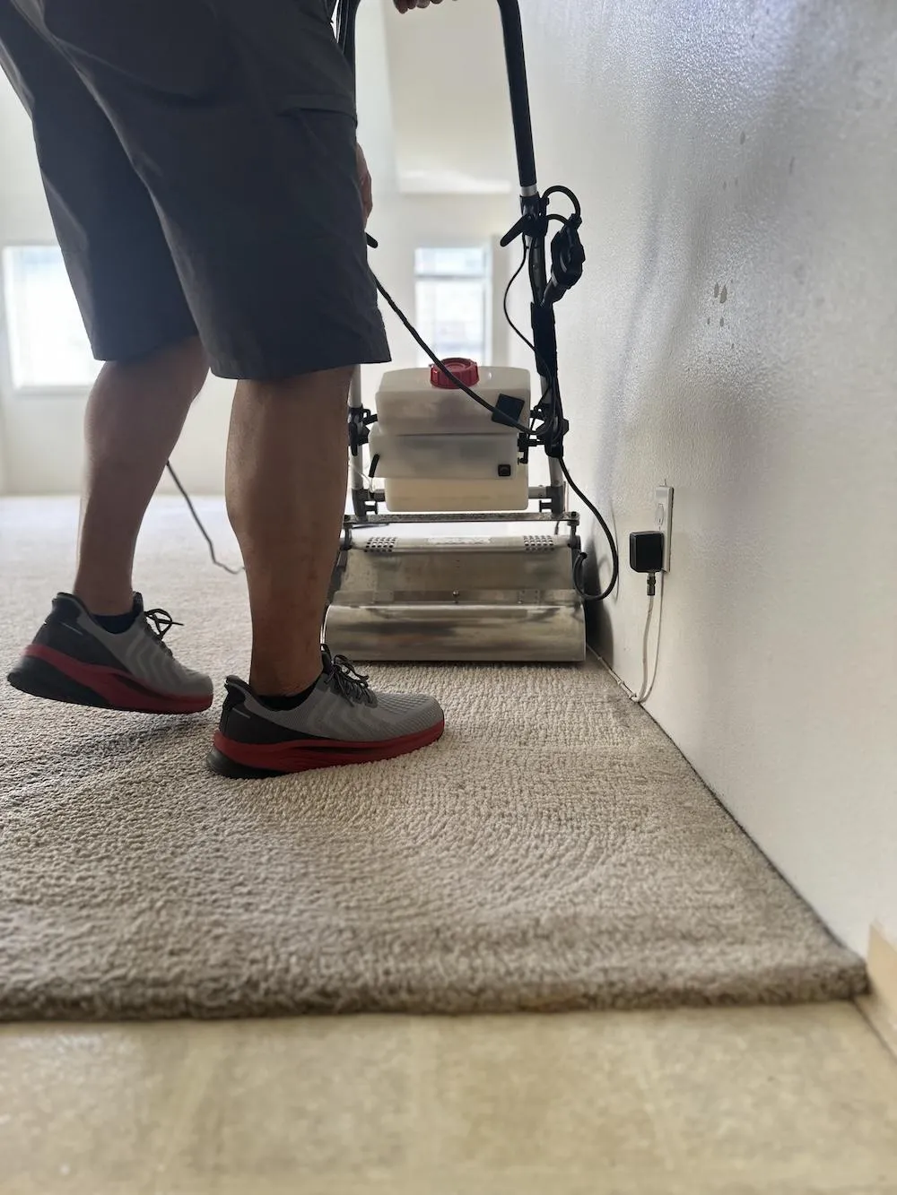 cleaning carpet edges close to the walls