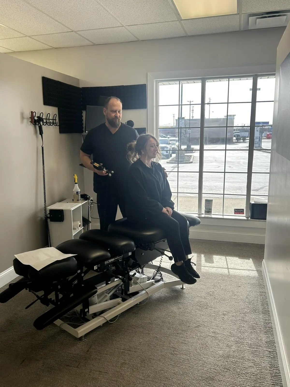 Dr. Bruce Phillips treating patient