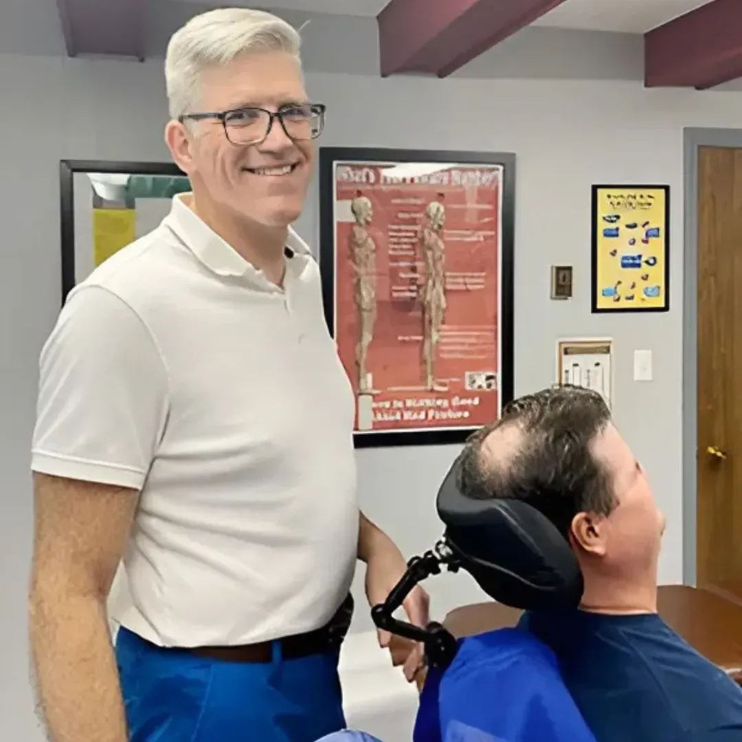 Dr. Phillips treating patient