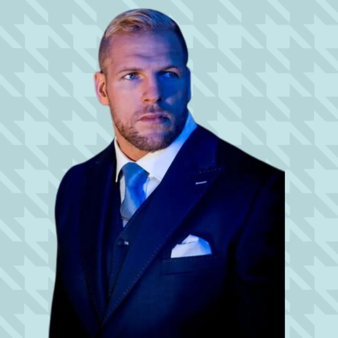 A muscular body builder in a custom suit that fits