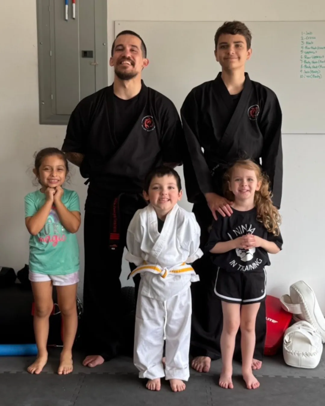 Photo of Sifu Joseph and Mr. William with Guppies class.