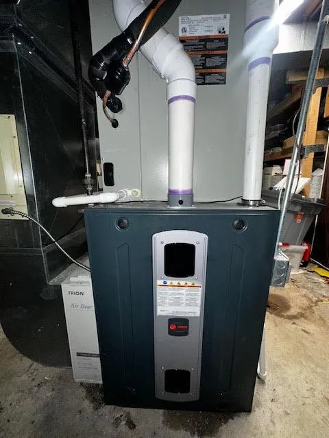 Furnace repair and heating system maintenance by skilled technician.