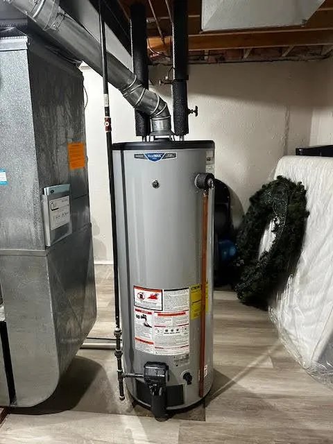 Professional technician repairing a furnace heating system.