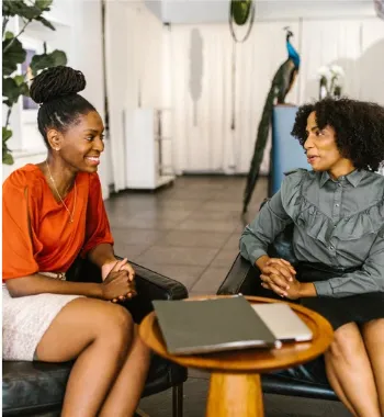 Two women having a personal guidance consultation