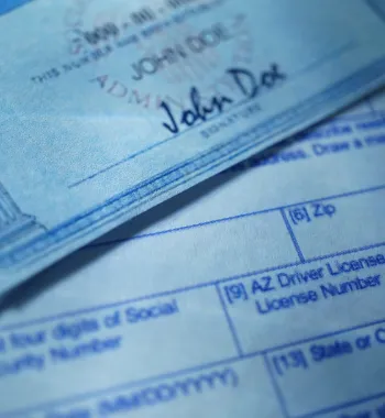 Identity-theft documents representing Catherine’s personal experience