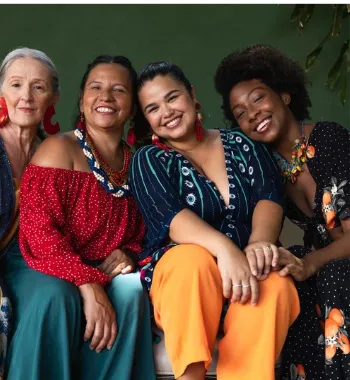A diverse family with a senior adult receiving support