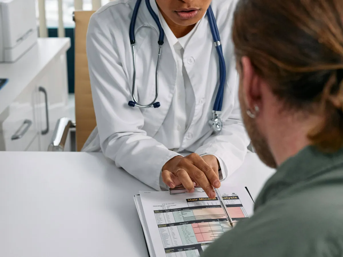 Doctor and patient reviewing a medical form