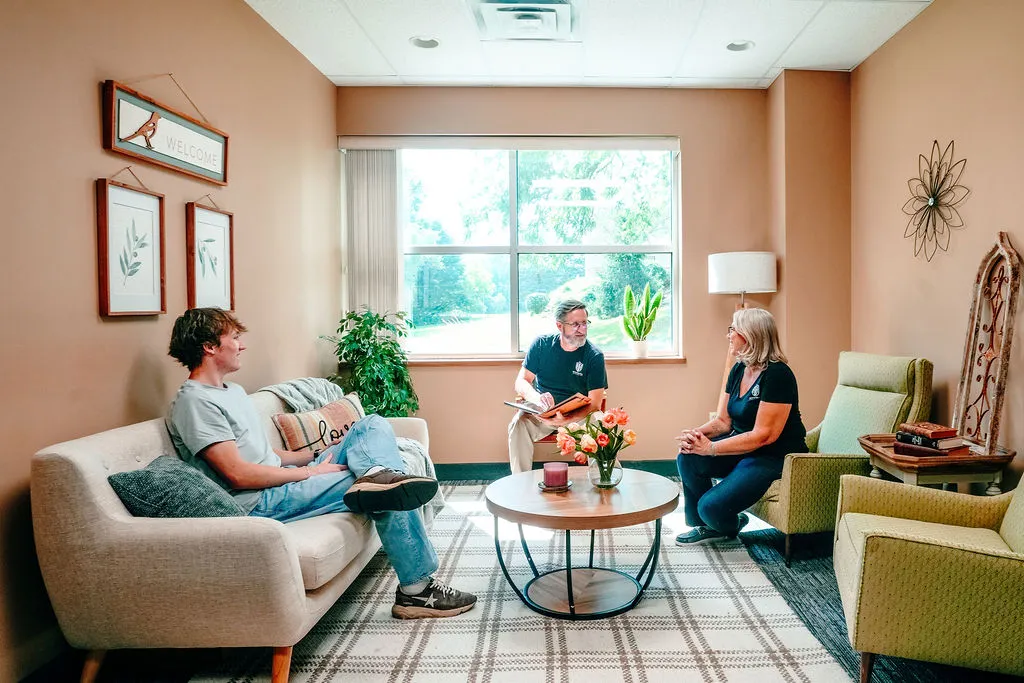 Dr. Herald having a conversation in the waiting room