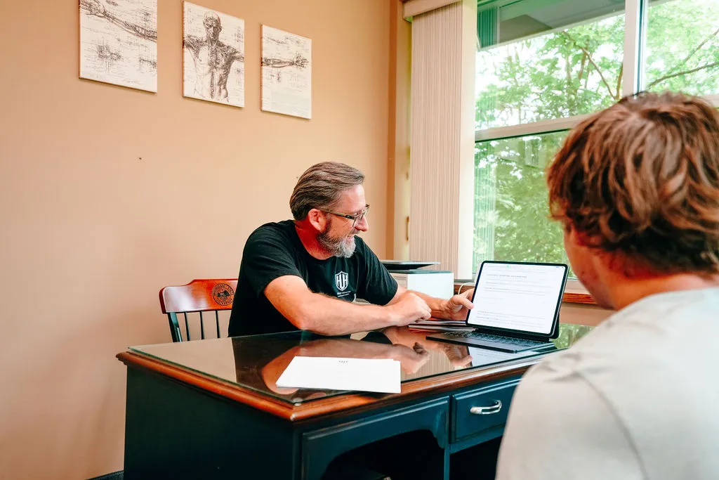Dr. Herald discussing a Herald Health Blueprint with a patient