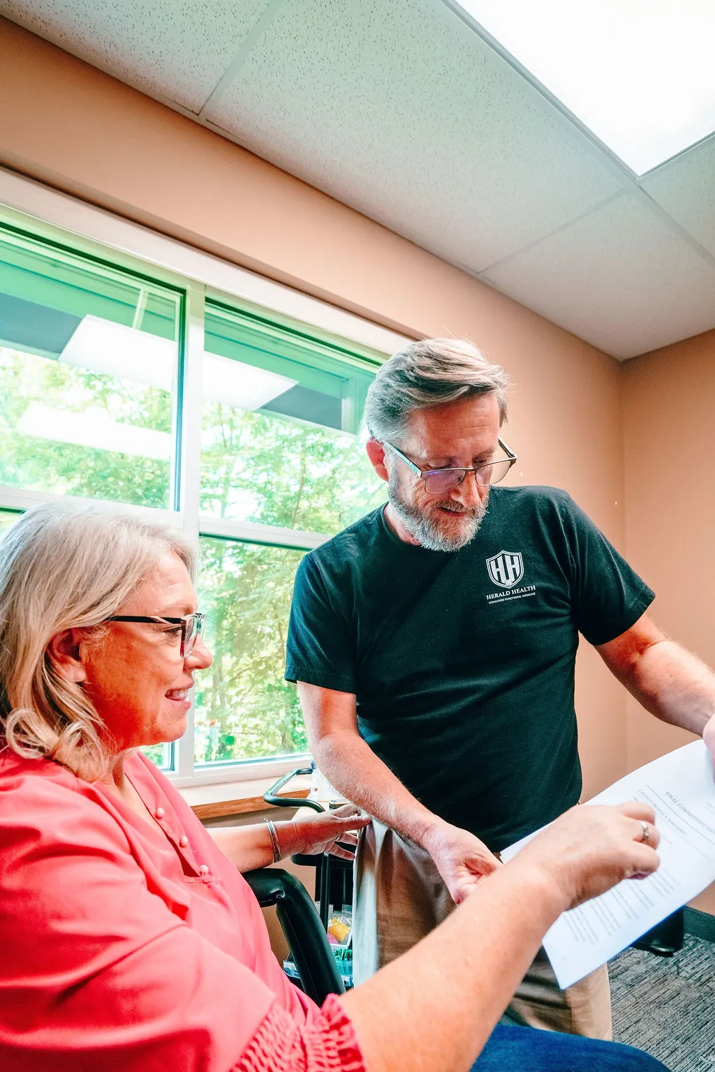 Dr. Herald discussing lab results with a patient