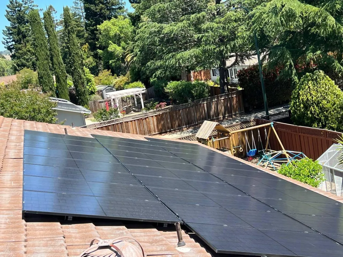 Large solar array on metal tile roof