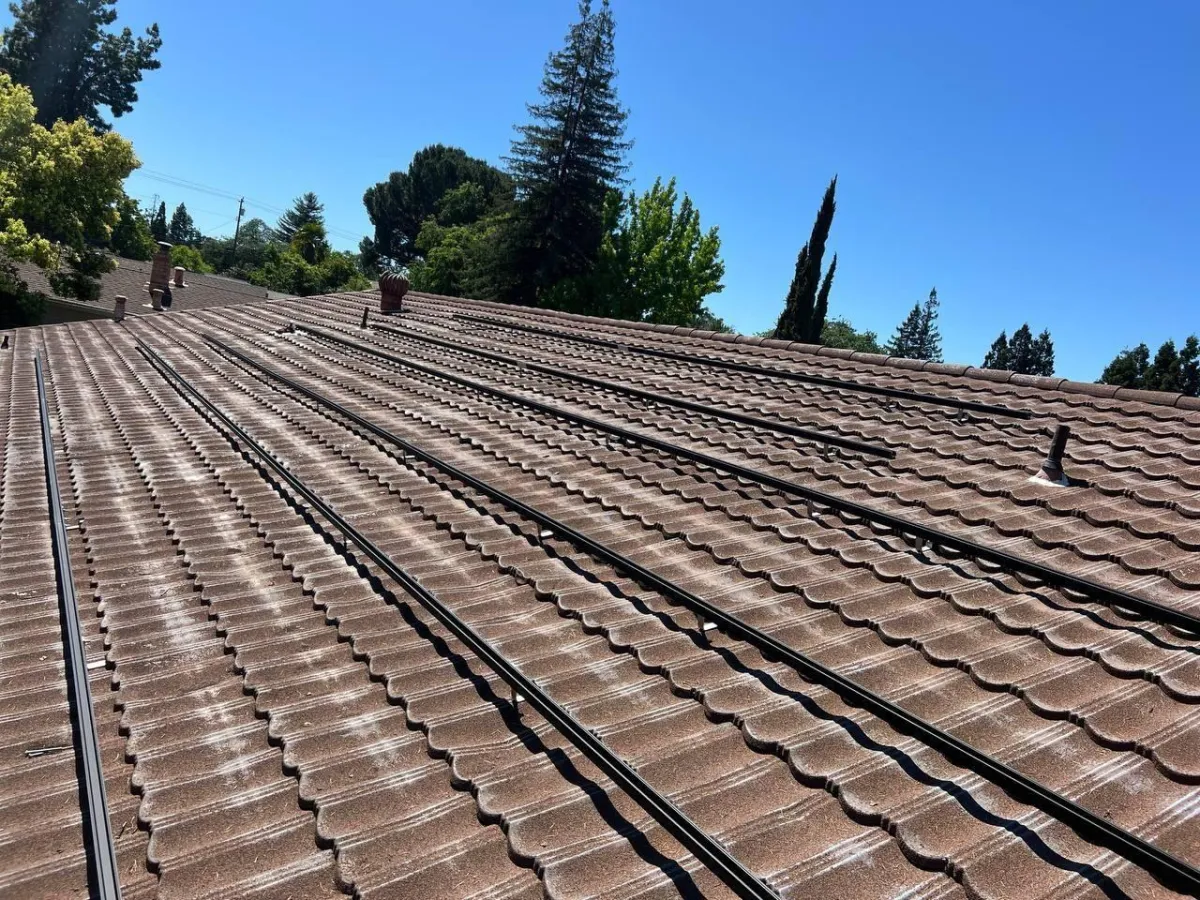 Custom solar mounts and racking for metal tile roofs including CalPac