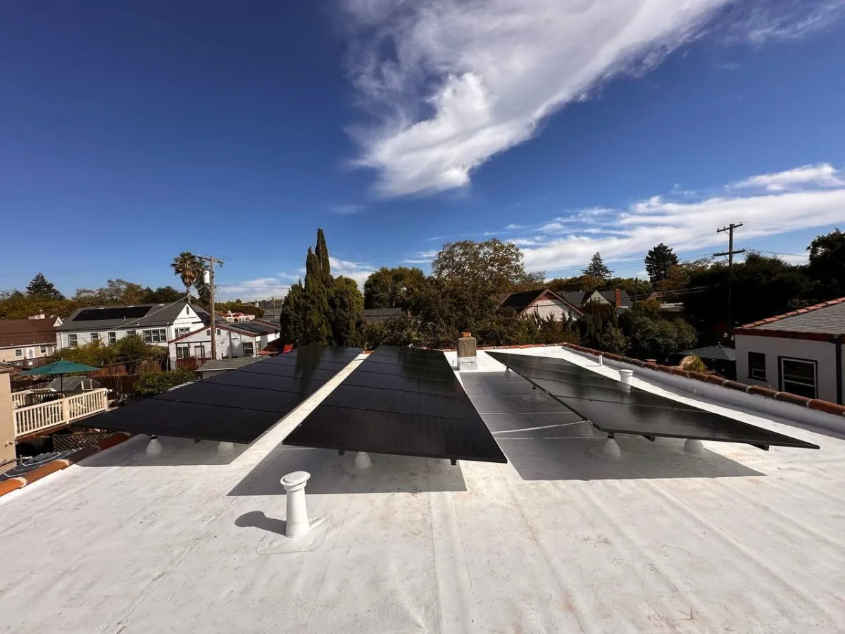 Multiple tilt solar arrays on a flat roof
